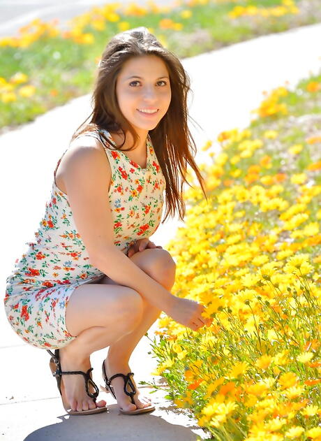 Svelte young Stacey in skirt revealing small tits and loving sex toy outdoor