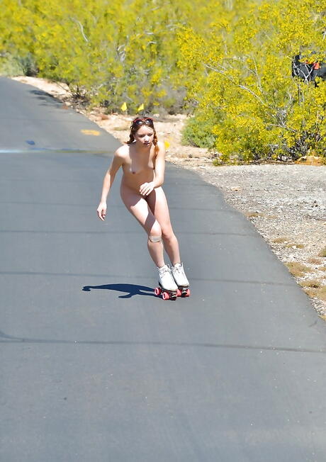 Slender russian teen Aurora Belle in skirt exposing tiny tits and shaved pussy outdoor